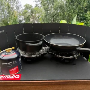 NomadiQ windscherm compact en stabiel voor buiten koken